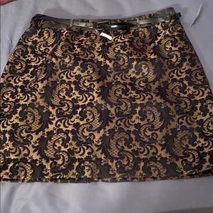 Black and tan/goldskirt